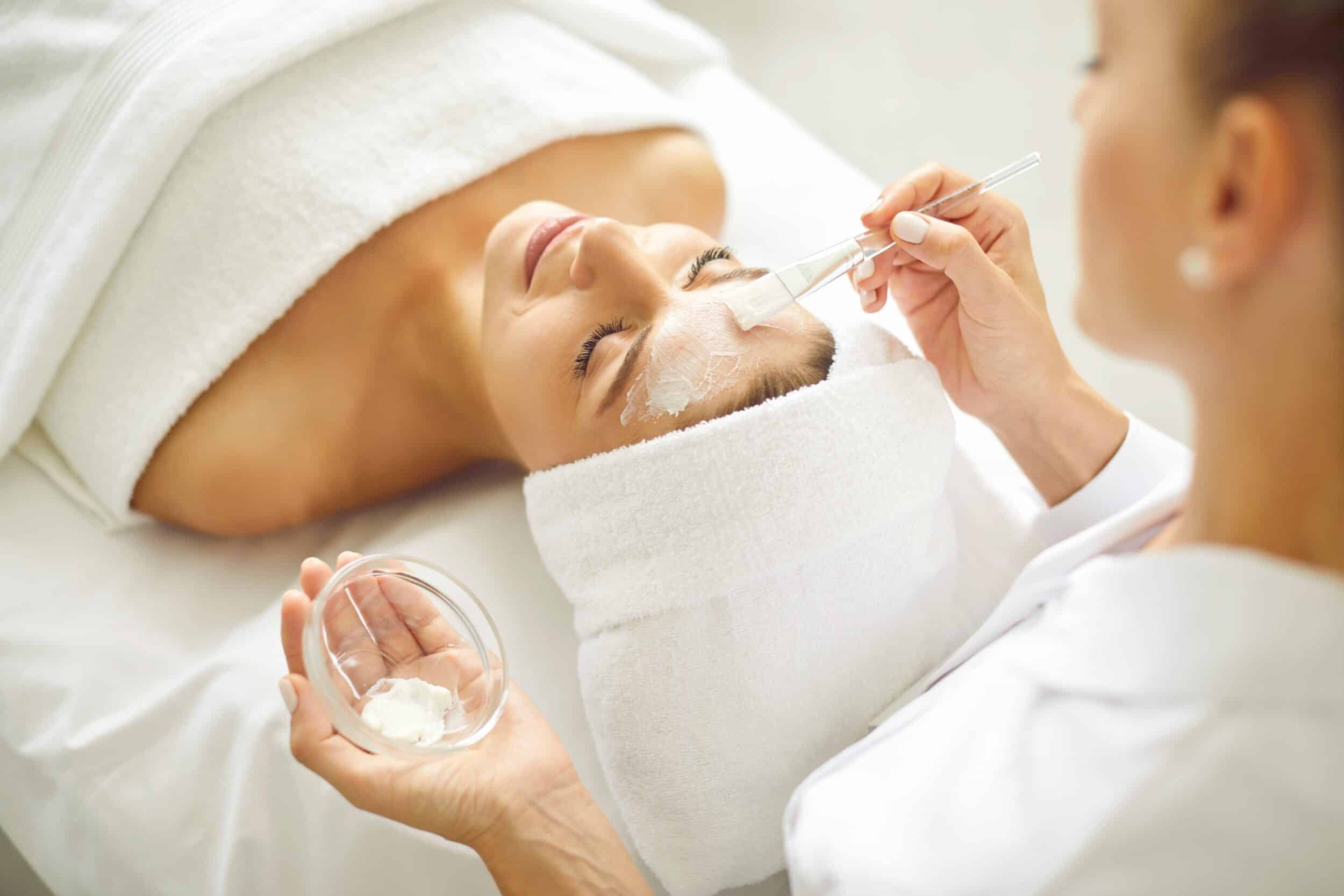 Relaxed woman getting a HydraFacial treatment in Dallas